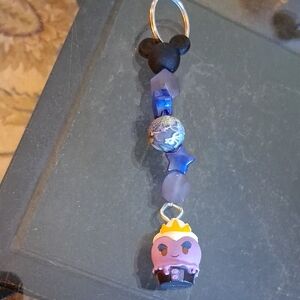 URSULA MUNCHLING DISNEY GALAXY KEYCHAIN